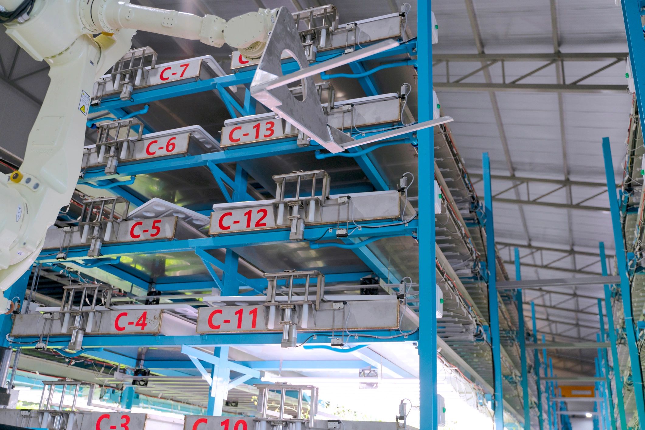 Modern lab automation equipment, representing quality control testing